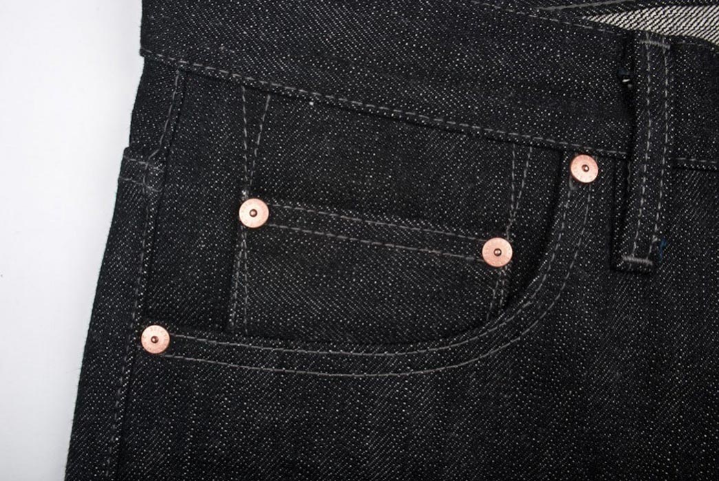 black raw denim jeans