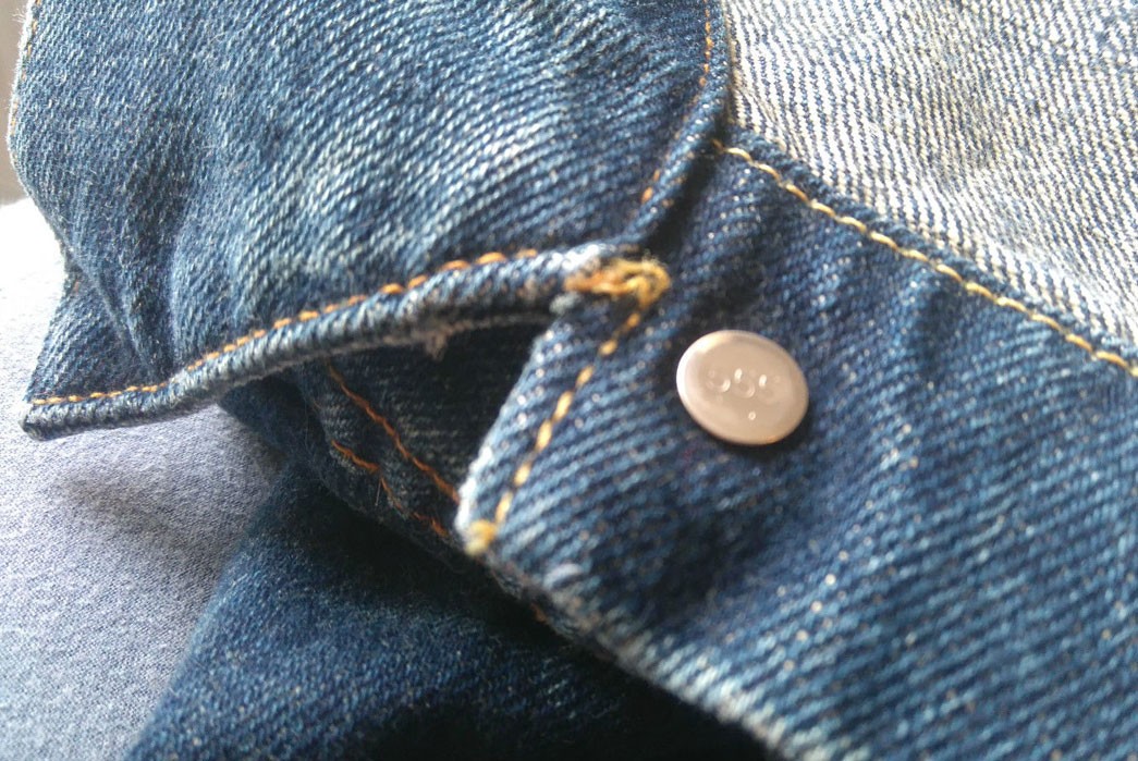levi button jeans