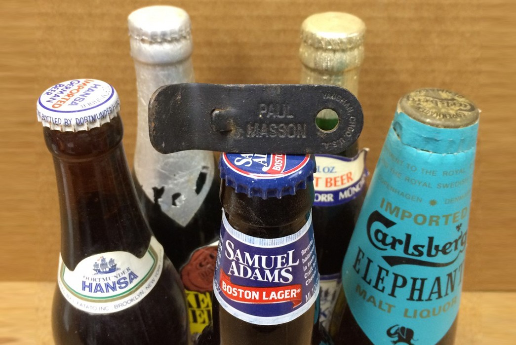 uncapping-the-history-of-bottle-openers Vintage Opener and bottles. Image via delishably.