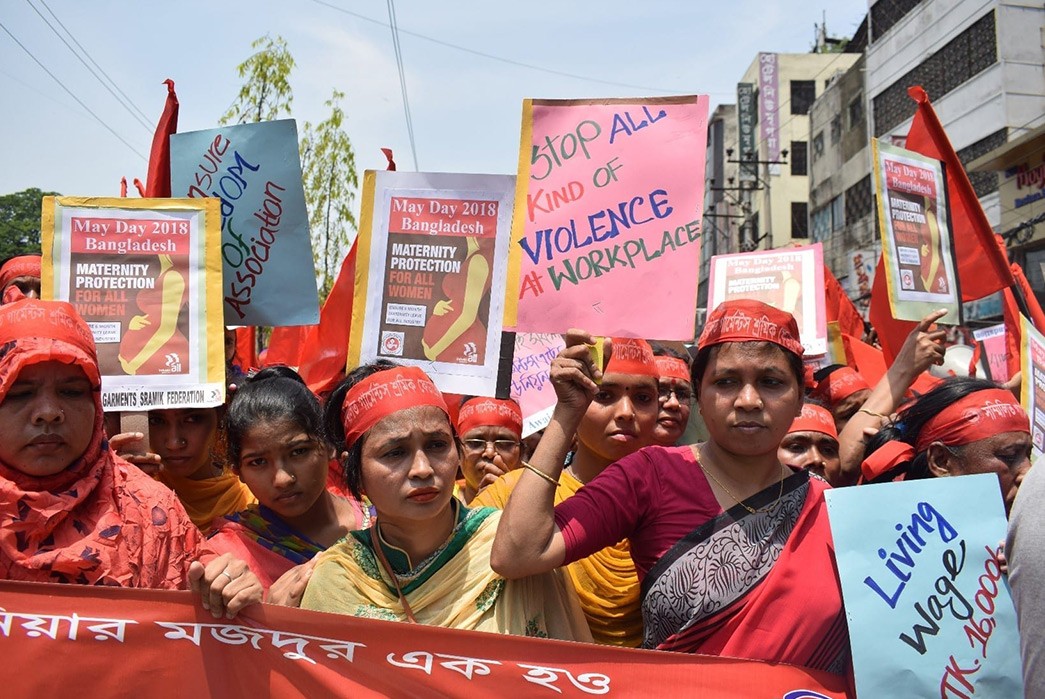 What-Are-Unions-and-Why-Are-They-Important-Women-in-Bangladesh-campaign-for-better-working-conditions-with-a-representative-from-the-labor-rights-organization-Solidarity-Centre.-Image-via-Solidari